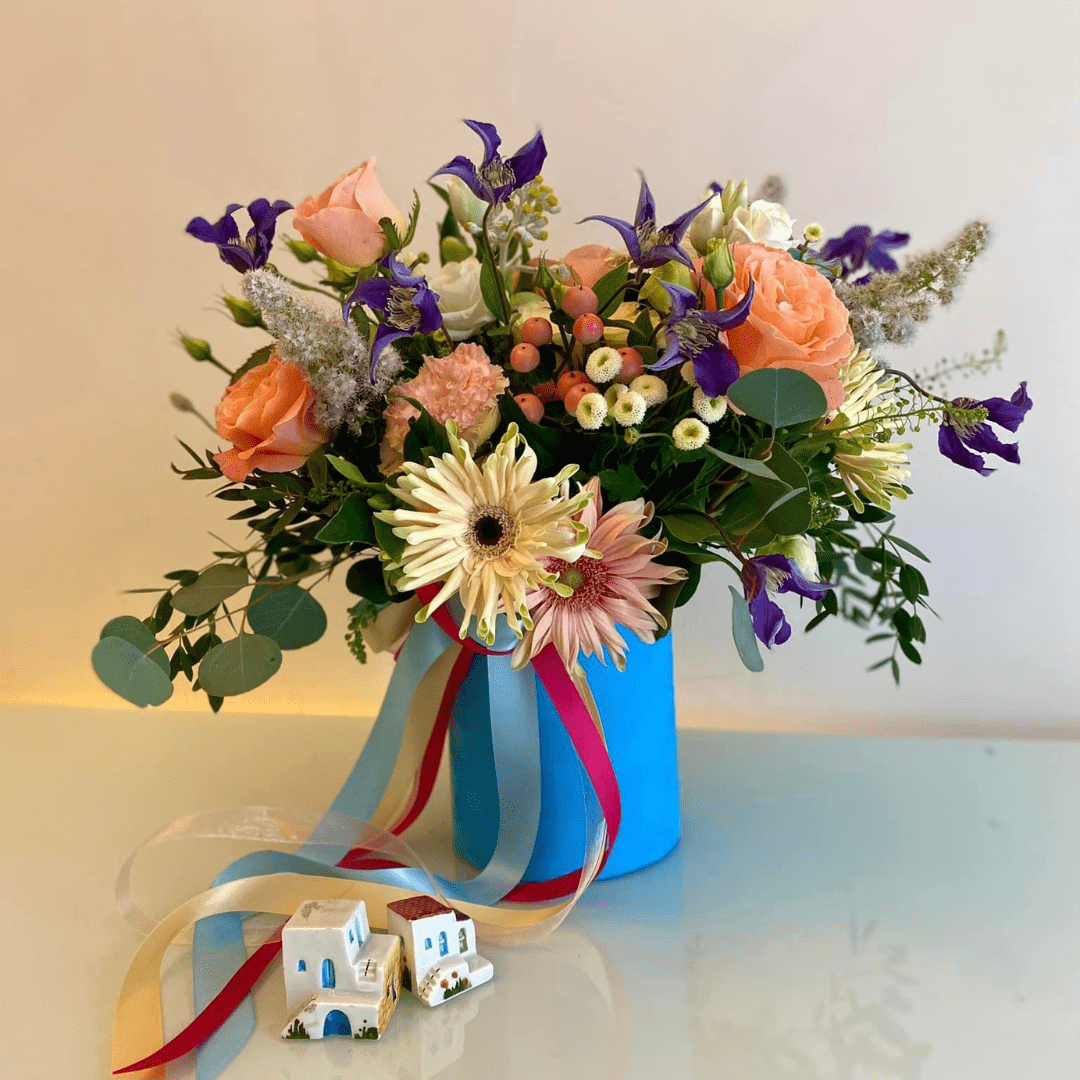 Cutie cu flori peach si mov